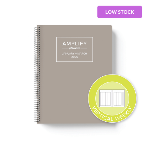 adaptable grey cover with graphic indicating vertical weekly layout option in Q1 2025 Amplify Planner