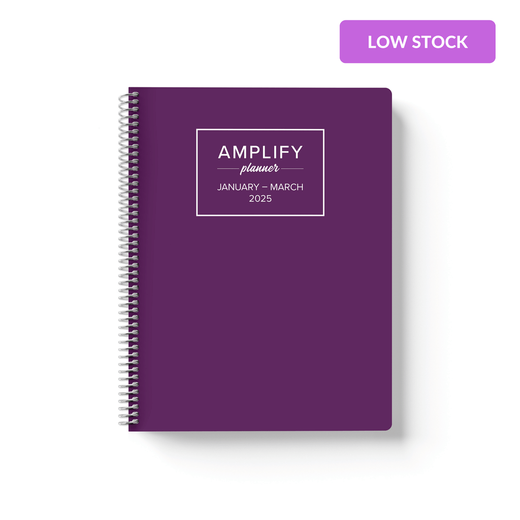 Ponder Purple cover of Amplify Planner Q1 2025 daily planner on a white background.